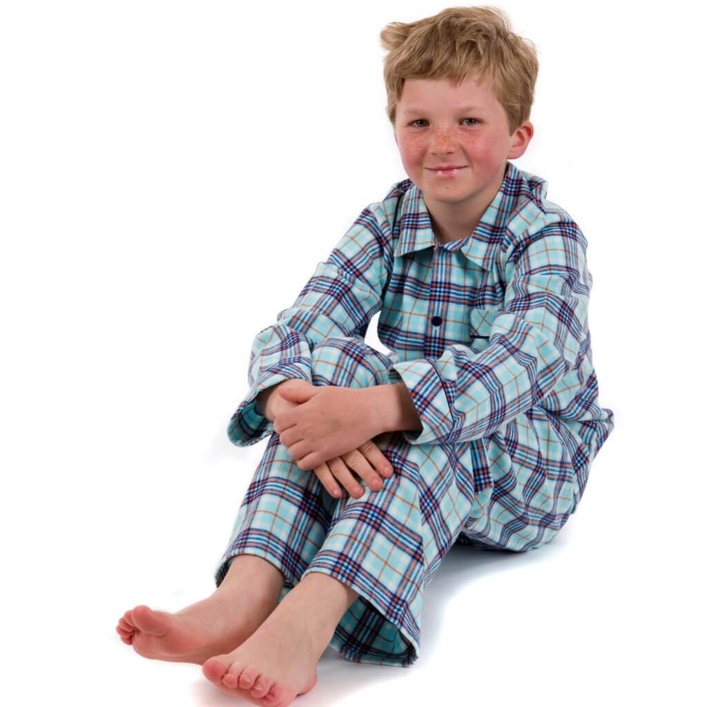 Freddie wearing brushed cotton spearmint blue check boys pyjamas with navy piping and buttons