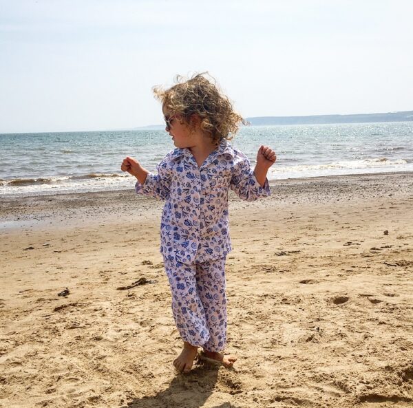 seashell pyjamas, little girls dancing by the sea