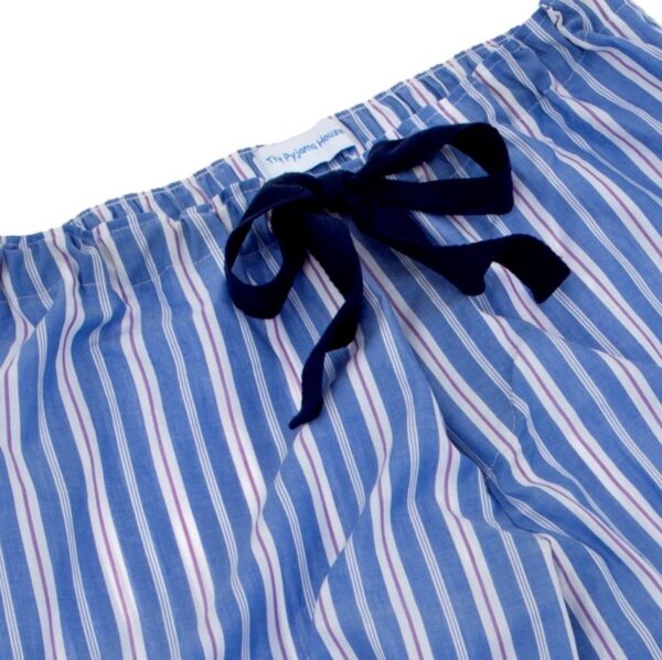 Close up of navy tie on deep blue PJ bottoms